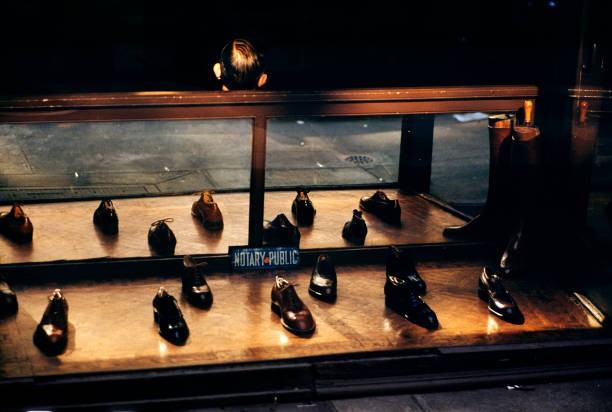 Display of shoes with the sign Public Notary in New York circa 1960 Old Photo