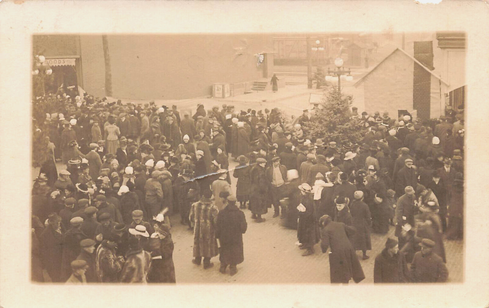 LARGE GROUP OF PEOPLE GATHERED IN CITY DOWNTOWN REAL PHOTO POSTCARD 1910s RPPC