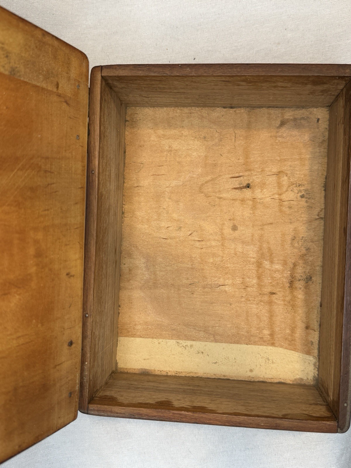 Vintage wooden box with hinged lid