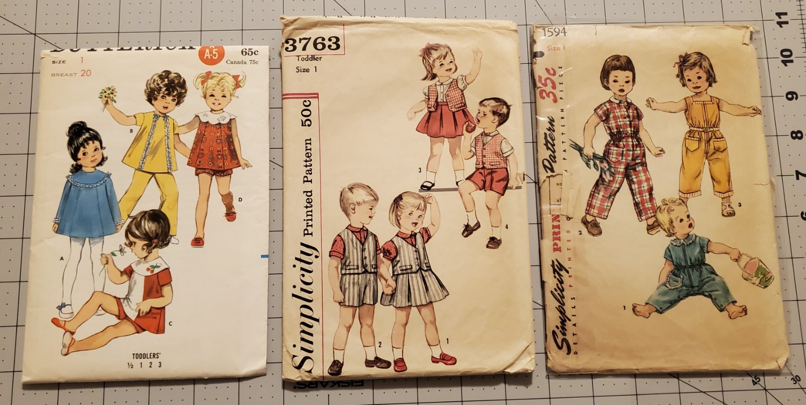 Lot of 3 Vintage Toddler Butterick 5521 Simplicity 3763, 1594 Sewing Patterns Lot of 3 Vintage Toddler Butterick 5521 Simplicity 3763, 1594 Sewing Patterns