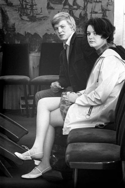 Two British young people waiting London 1960s Historic 1960s Old Photo