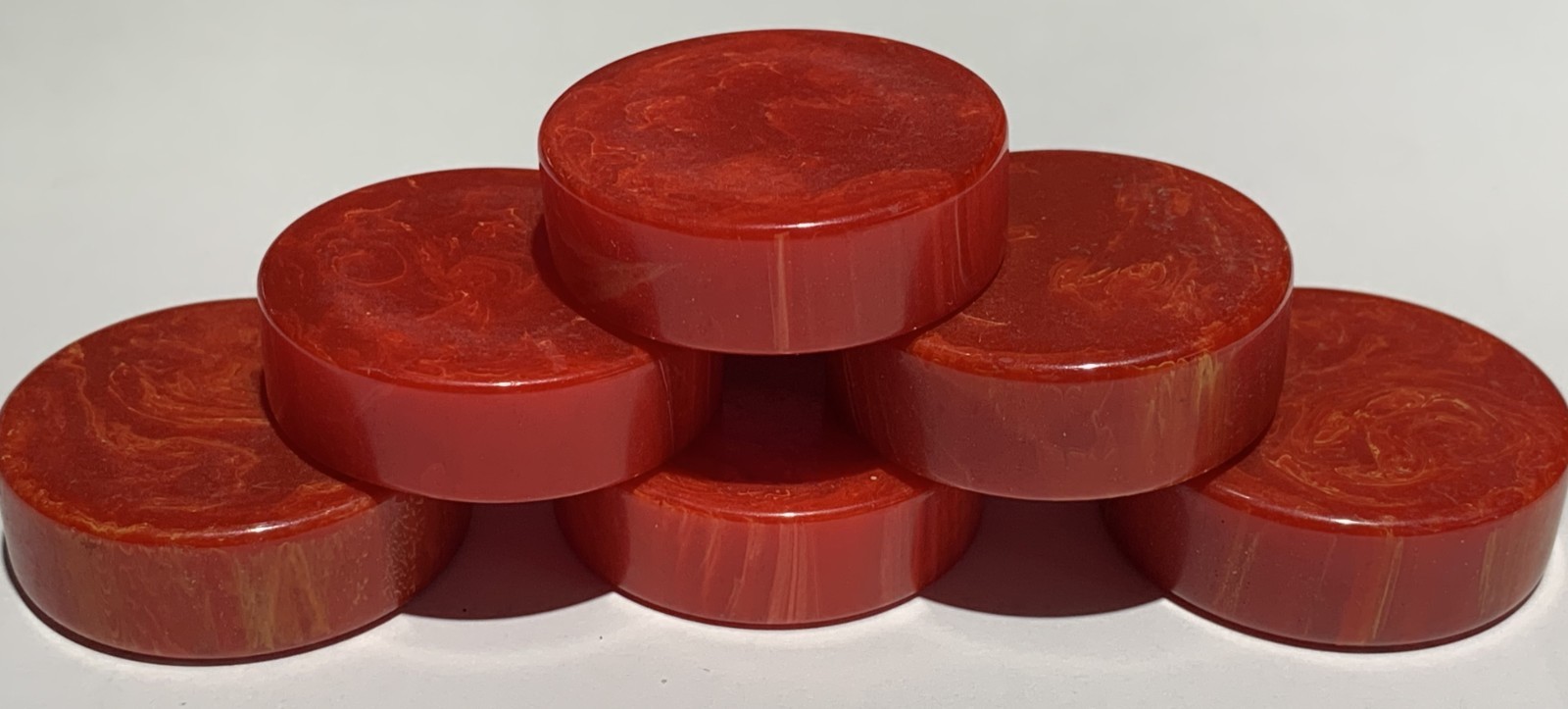 6 Large Vintage Bakelite Marbled Red Checkers or Backgammon.  37 mm by 12 mm.