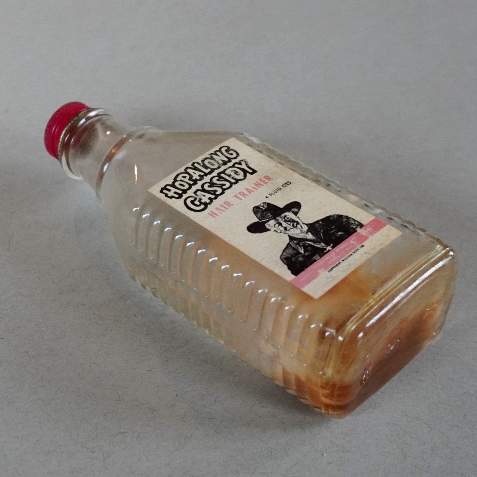 VTG 1950's Associated Brands HOPALONG CASSIDY Hair Trainer - 4 oz Bottle w/Lid