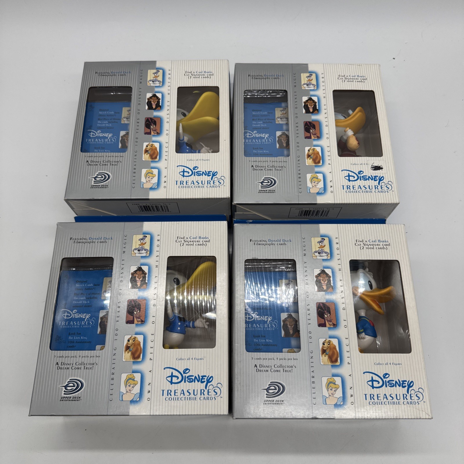 Upper Deck 2003 Disney Treasures 20-Card Box with Figures - Lot of 4 Upper Deck 2003 Disney Treasures 20-Card Box with Figures - Lot of 4