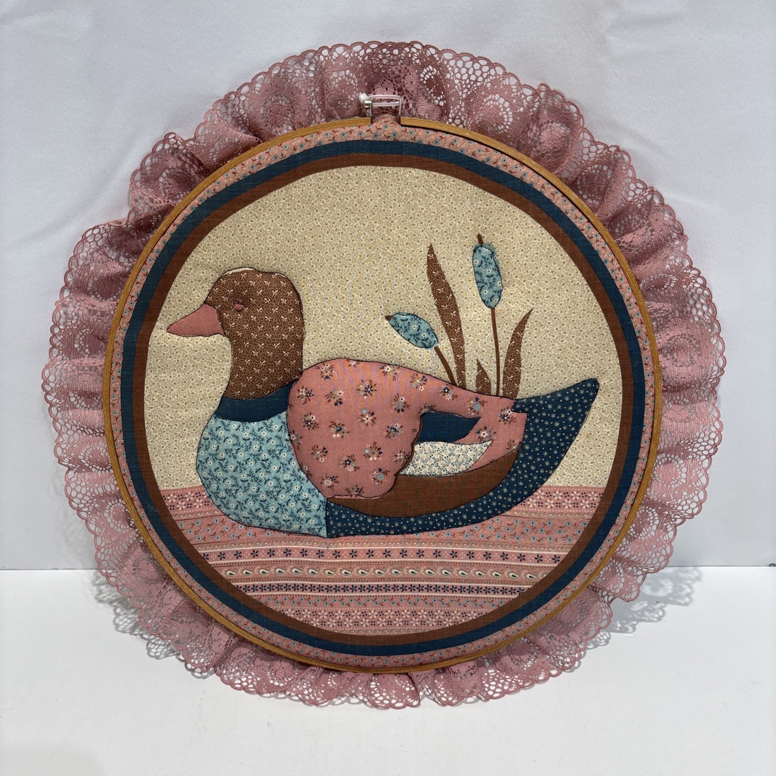 VTG 1970s quilted patchwork Lace duck wall piece set within a wooden embroider