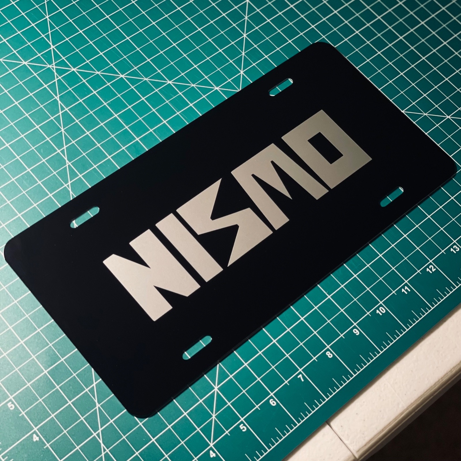 Nismo OLD LOGO Vanity License Plate Car Tag Decal – Aluminum Metal Nismo OLD LOGO Vanity License Plate Car Tag Decal – Aluminum Metal