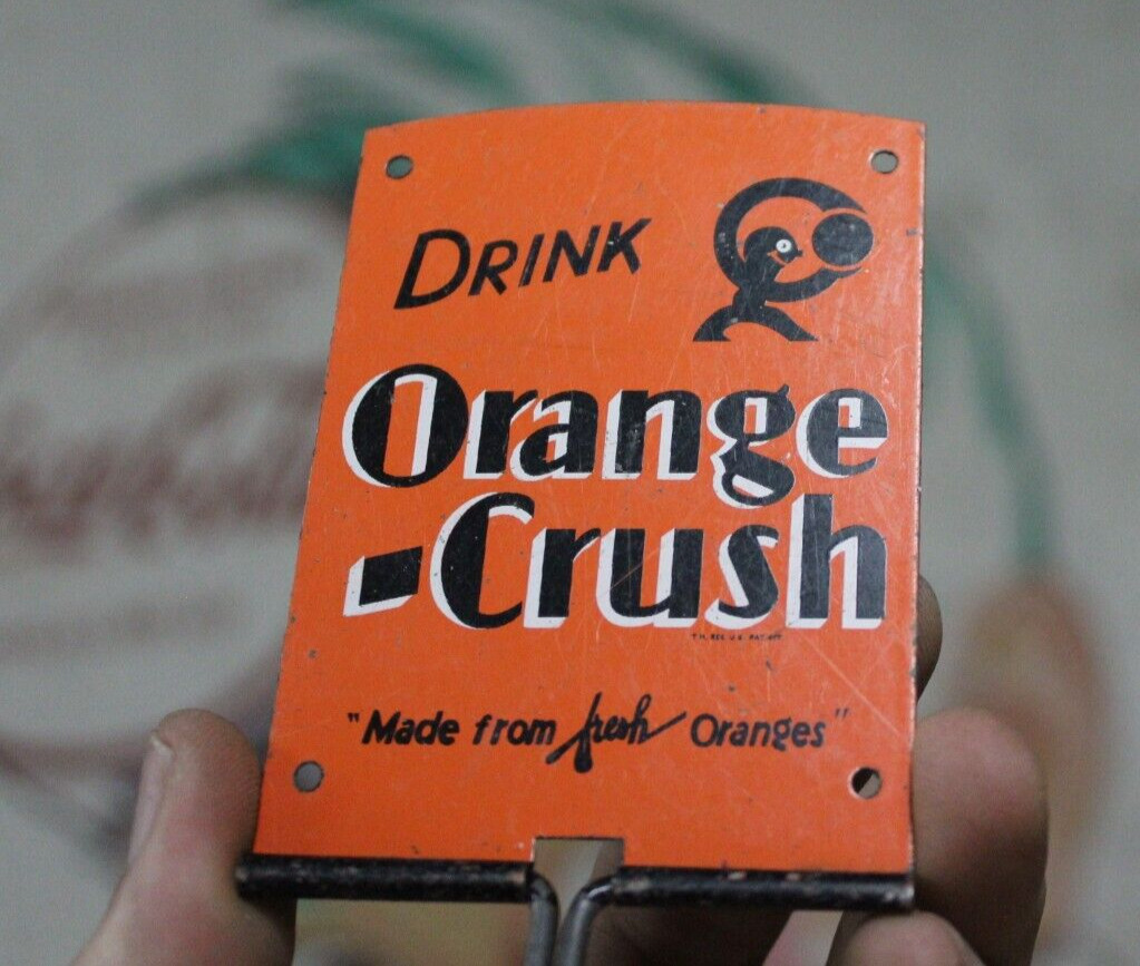 1930s CRUSHY DRINK ORANGE CRUSH  SODA POP STORE PROMO METAL BROOM HOLDER SIGN