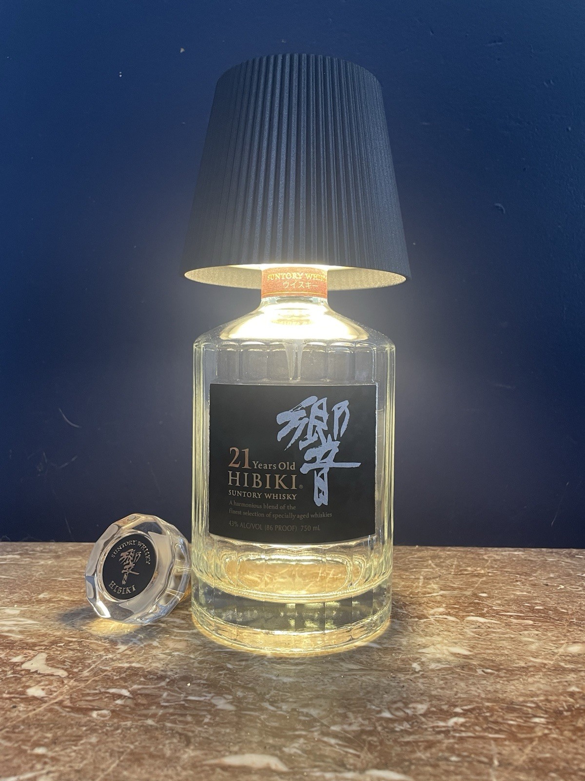 Japanese Hibiki 21 authentic bottle with LED touch lamp.