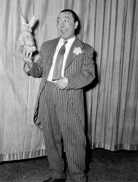 Italian actor comedian Erminio Macario performing a comic gag usin- Old Photo Italian actor comedian Erminio Macario performing a comic gag usin- Old Photo