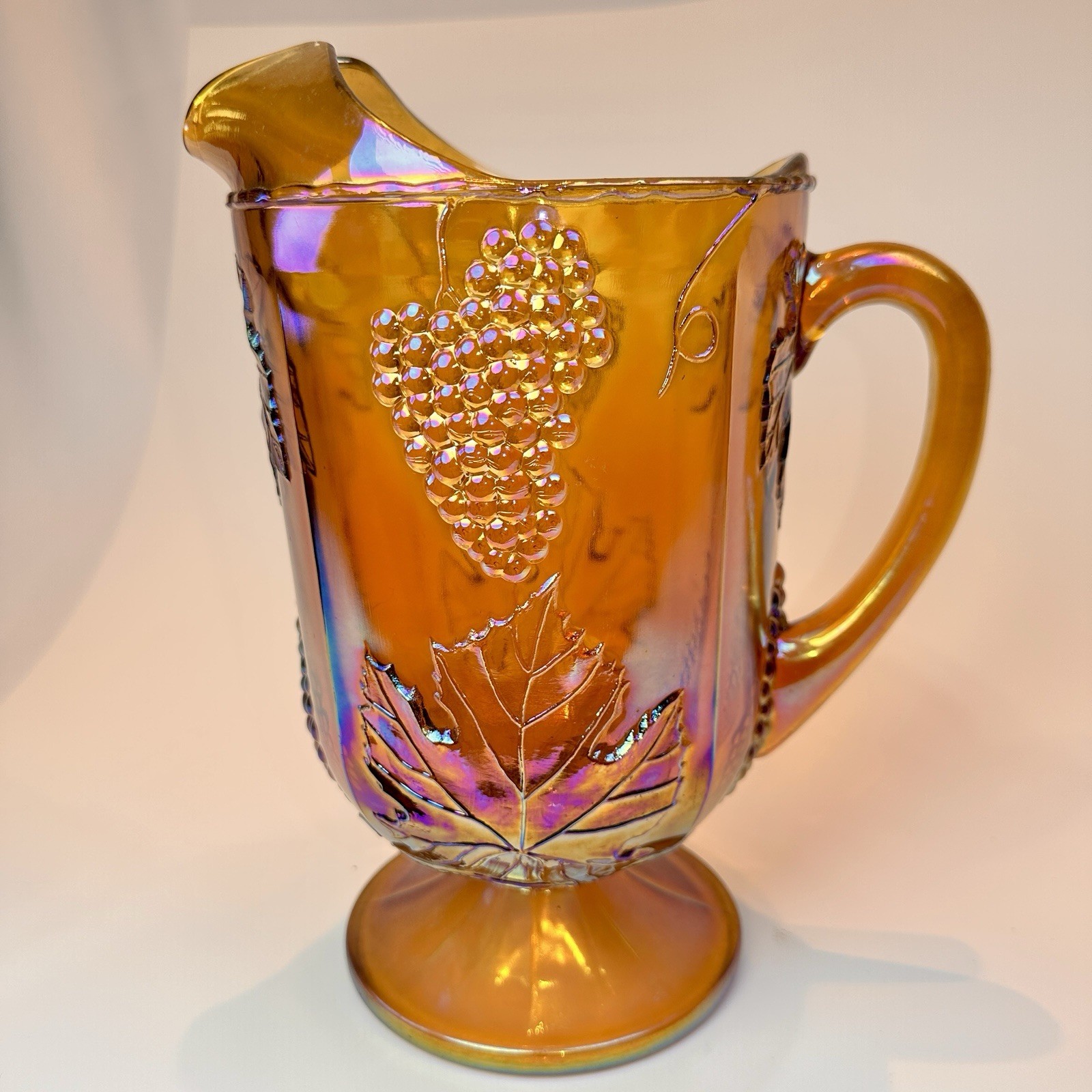 Indiana Glass IRIDESCENT MARIGOLD Harvest Grape CARNIVAL GLASS Footed Pitcher Indiana Glass IRIDESCENT MARIGOLD Harvest Grape CARNIVAL GLASS Footed Pitcher
