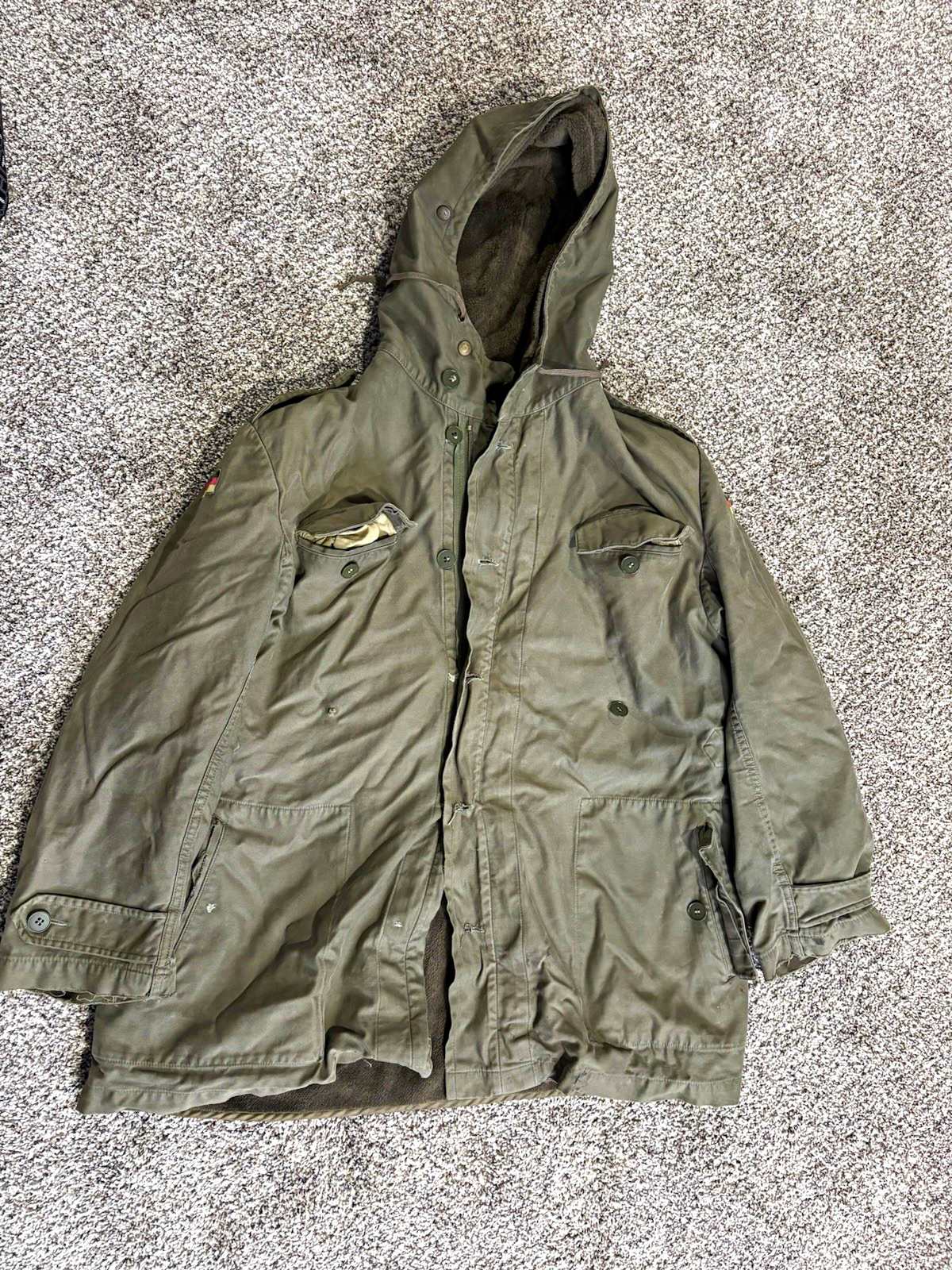 True Vintage German Military Parka Jacket with patches and fur lining.