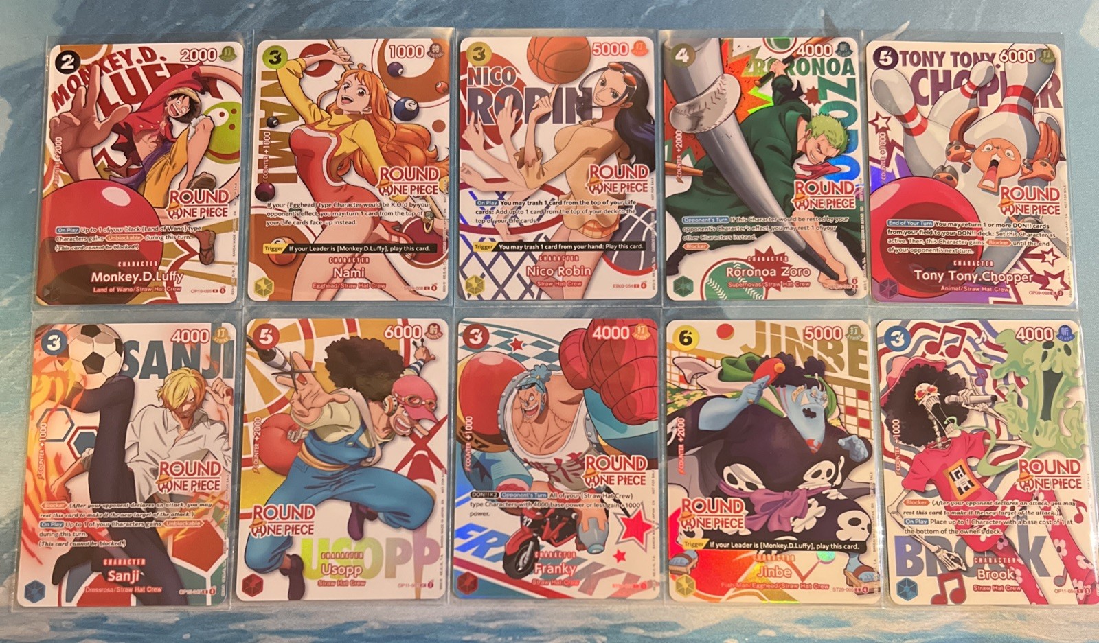 Round 1 x One Piece Promo Cards - Full Set of 10 English + 2 Keychains