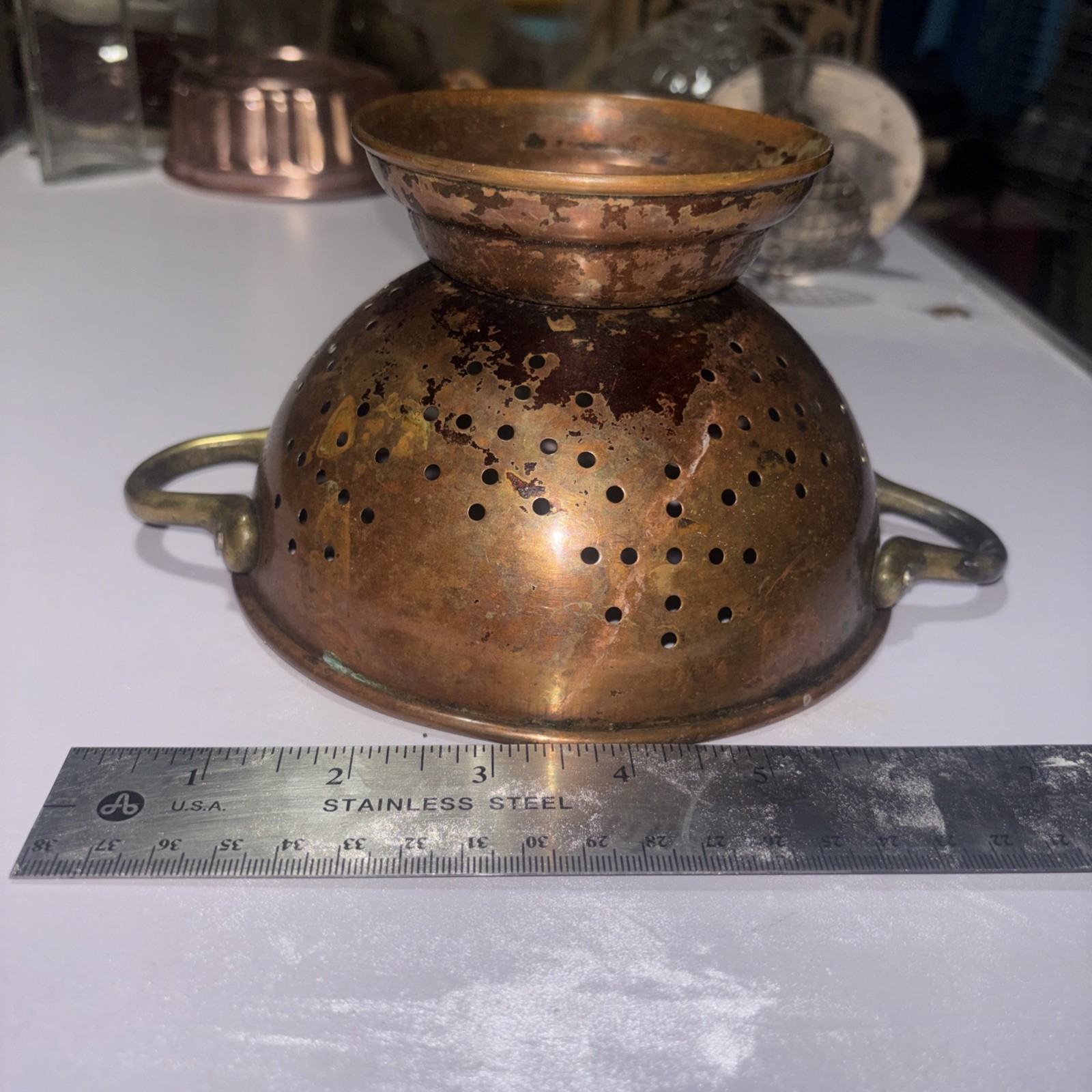 vintage copper and brass pedestal colander