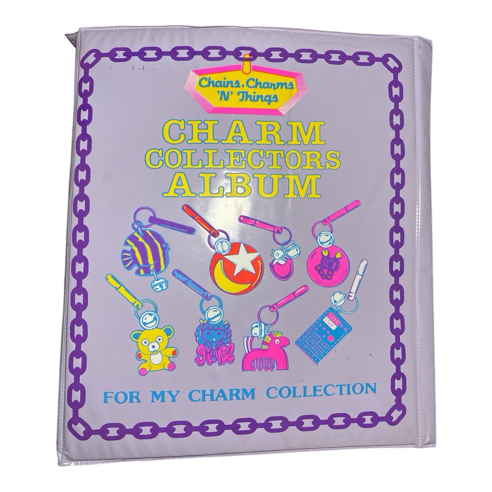Vtg. 1985 Imperial 31 Charms 2 Chains Purple Collectors Album Bell Charms Vtg. 1985 Imperial 31 Charms 2 Chains Purple Collectors Album Bell Charms