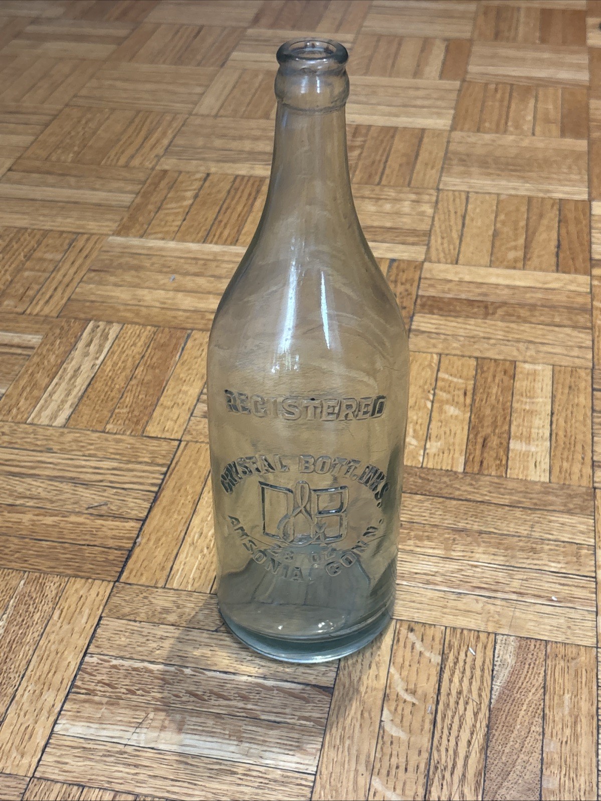 Antique D & B CRYSTAL BOTT. WKS. Ansonia, CT Embossed 28 oz Glass Soda Bottle
