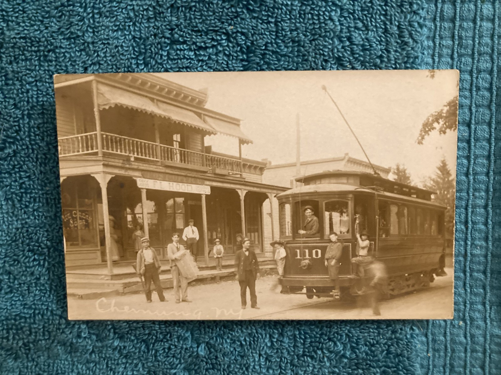 RPPC Chemung New York FL Hood Store with Single Track Trolley Posted c1910