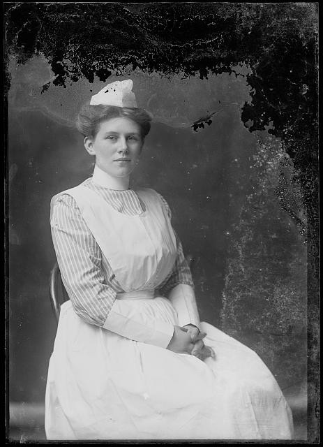 Photo:Unidentified Woman in Nurse Uniform Portrait ca 1873 1916