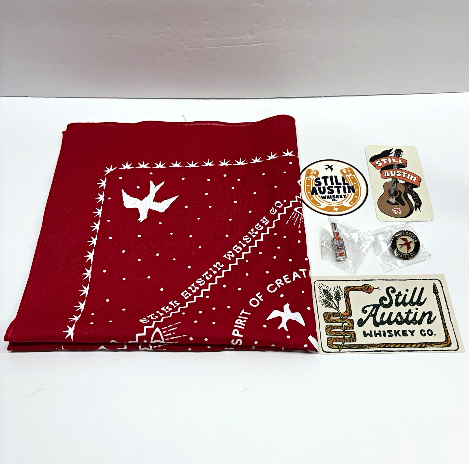 Still Austin Whiskey Co. Distillery Lot: Red Bandana, Stickers & Pin Set