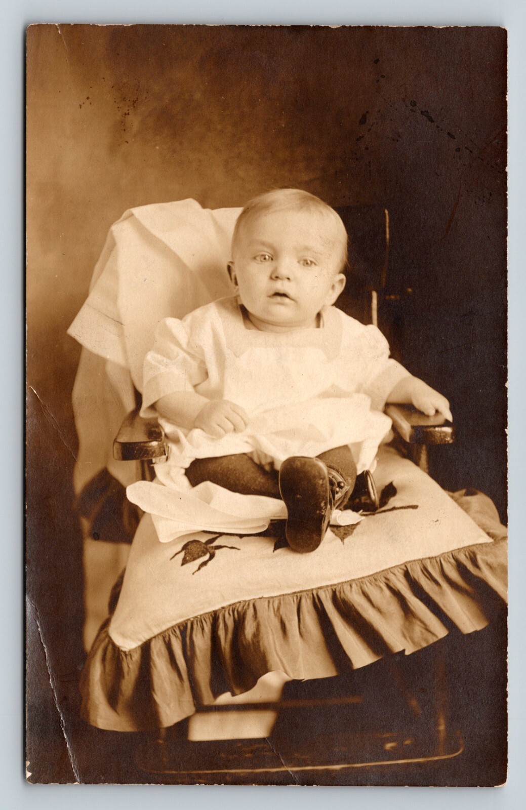 1904-1918 RPPC Adorable Baby Sitting On Chair w/ Little Shoes ANTIQUE Postcard