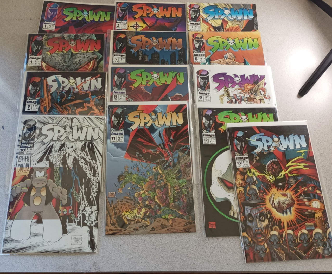 Spawn 1992 Image Comics lot issues 1-13 early run near mint condition Spawn 1992 Image Comics lot issues 1-13 early run near mint condition