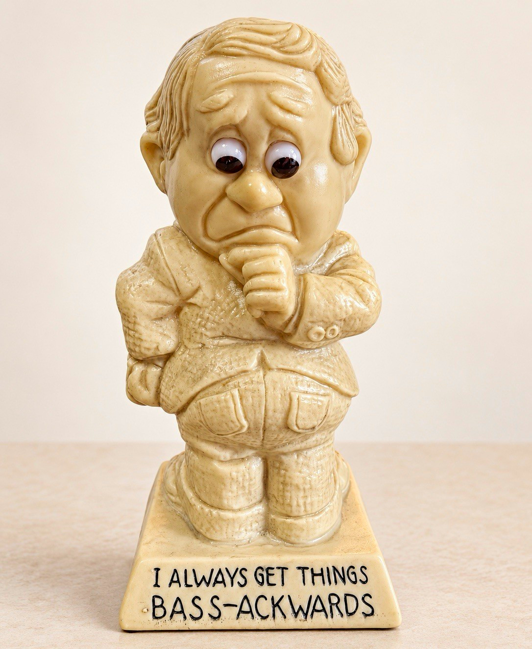 Wallace Berrie & Co., Inc. 1973 Bass-Ackwards Man Figurine Ceramic Beige