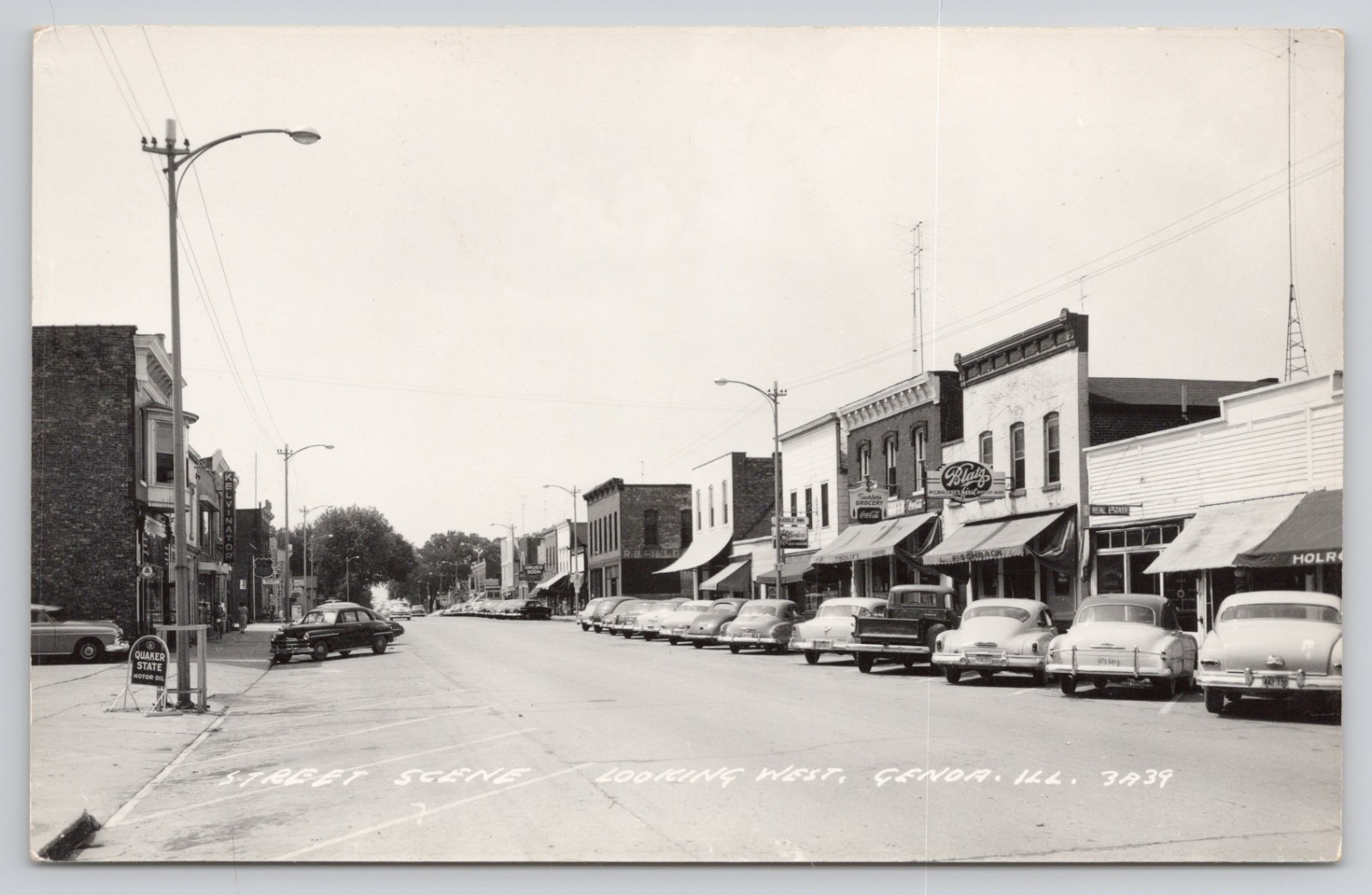 Real Photo Postcard Genoa IL Street Quaker State Coca Cola Bordon Ice Cream RPPC