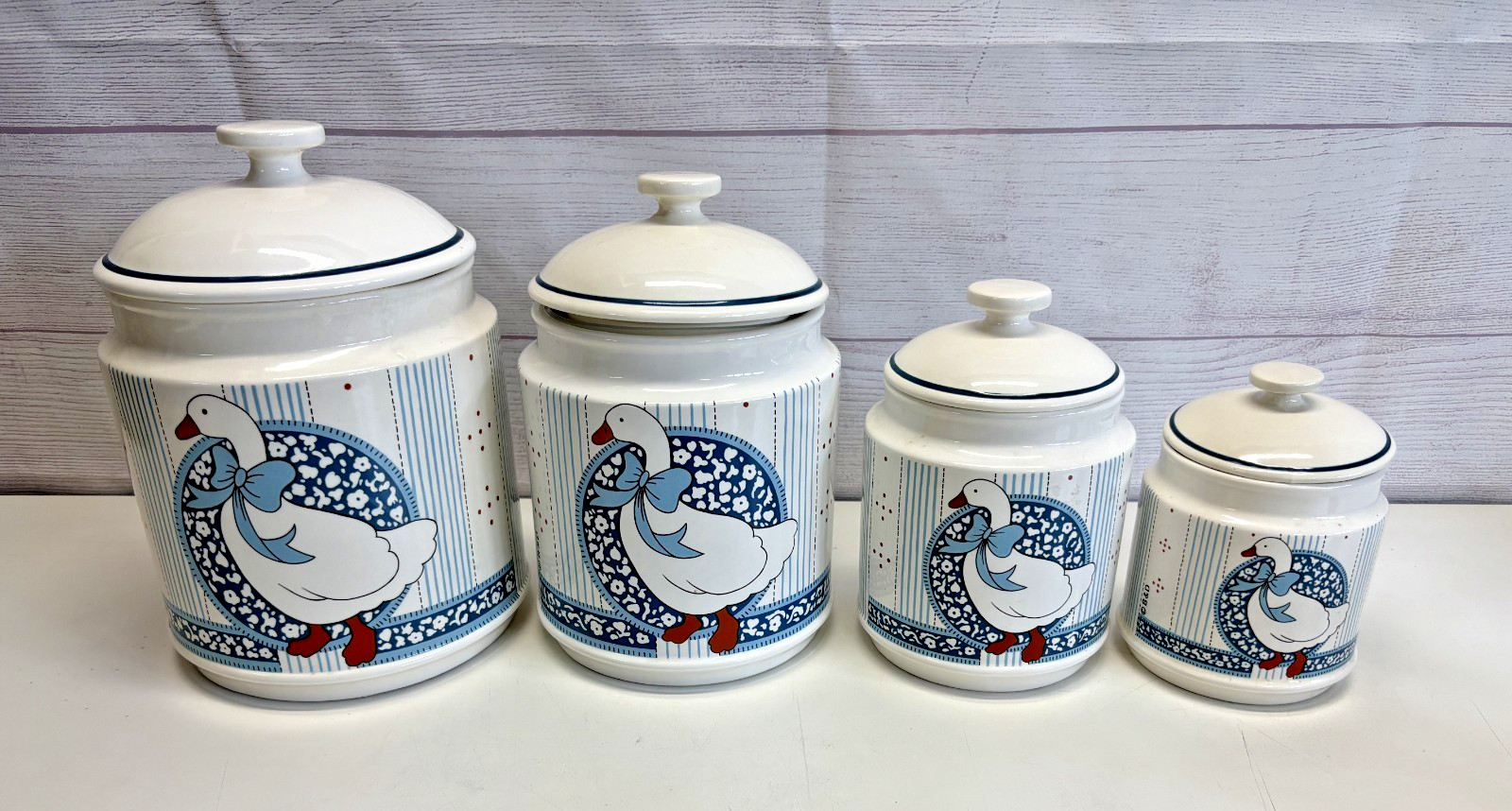 Vintage 1980s B&D Mother Goose Blue Ribbon Bow Ceramic Canister Kitchen Set of 4