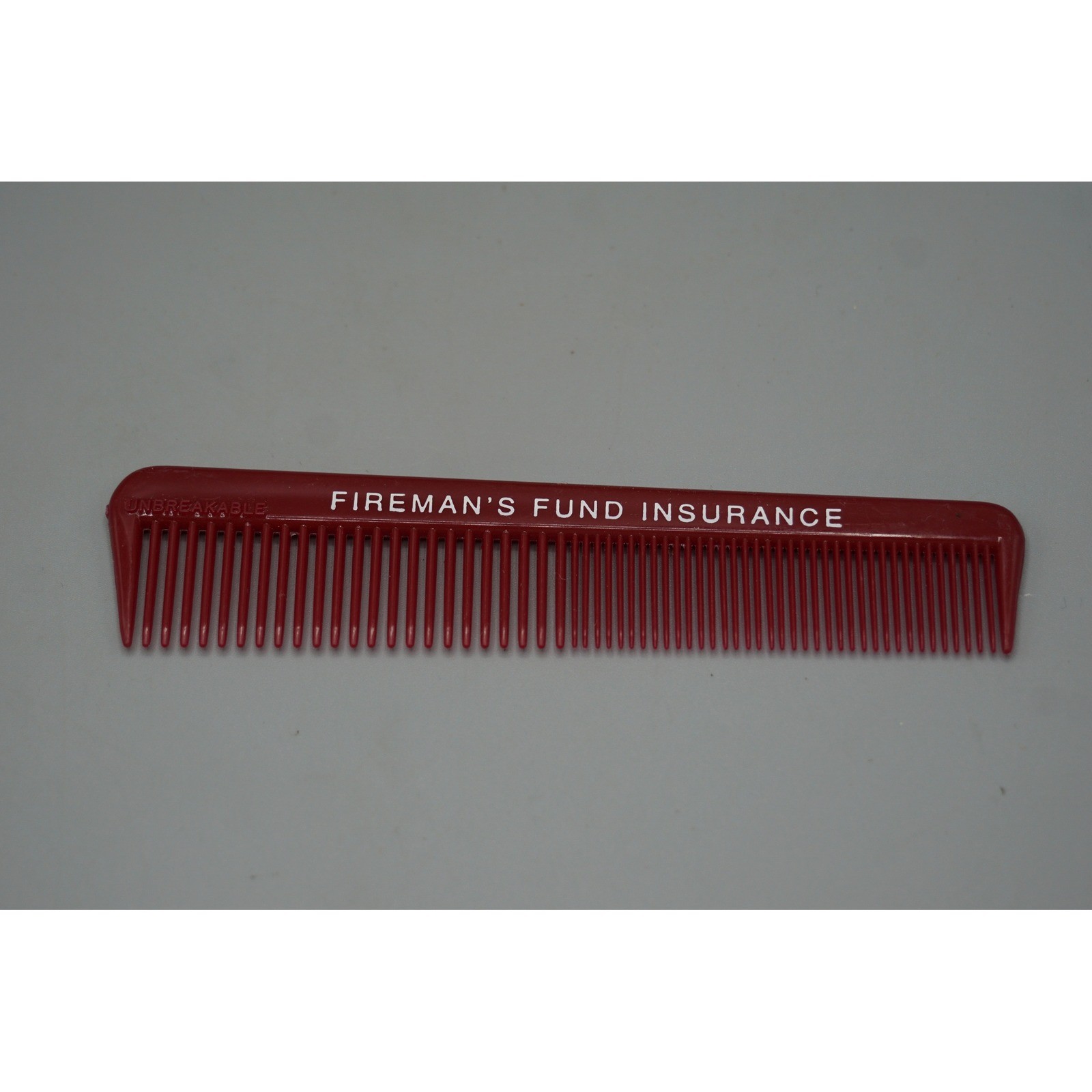 Vintage Fireman's Fund Insurance Advertising Pocket Comb Unbreakable Maroon 5in