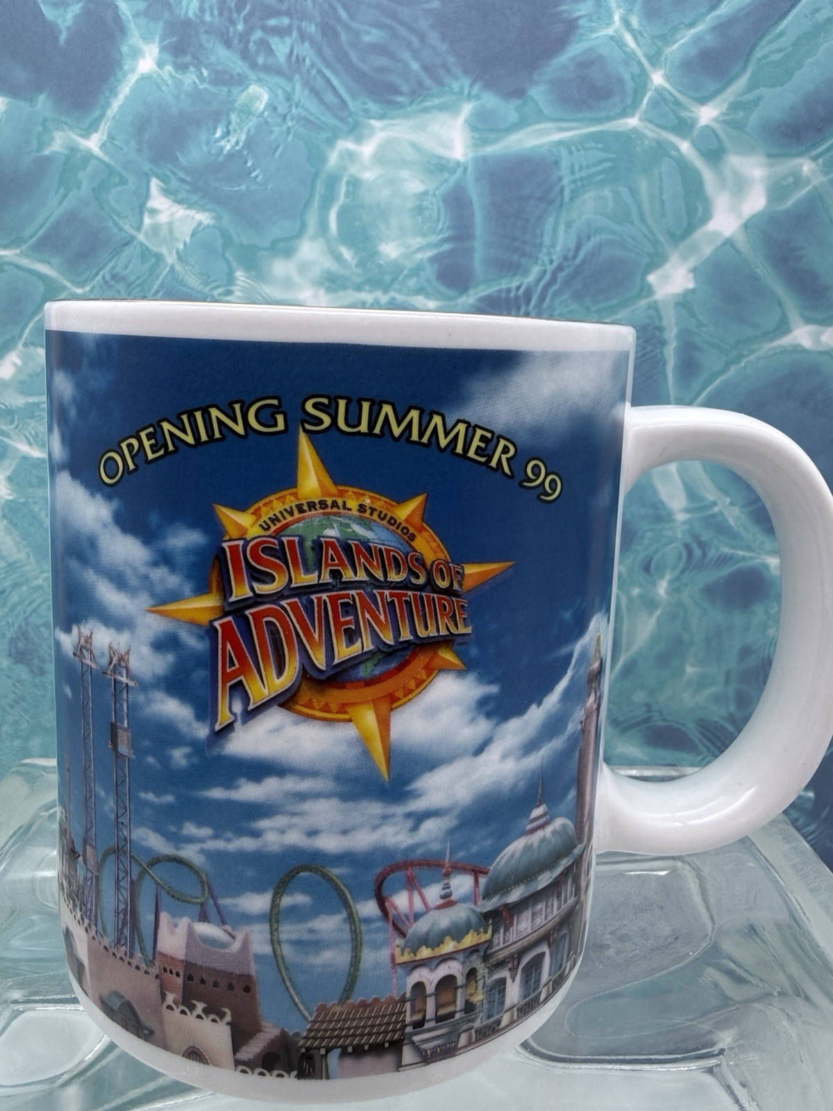 1999 UNIVERSAL STUDIOS ISLANDS OF ADVENTURE COFFEE MUG, HOLLYWOOD, CA *