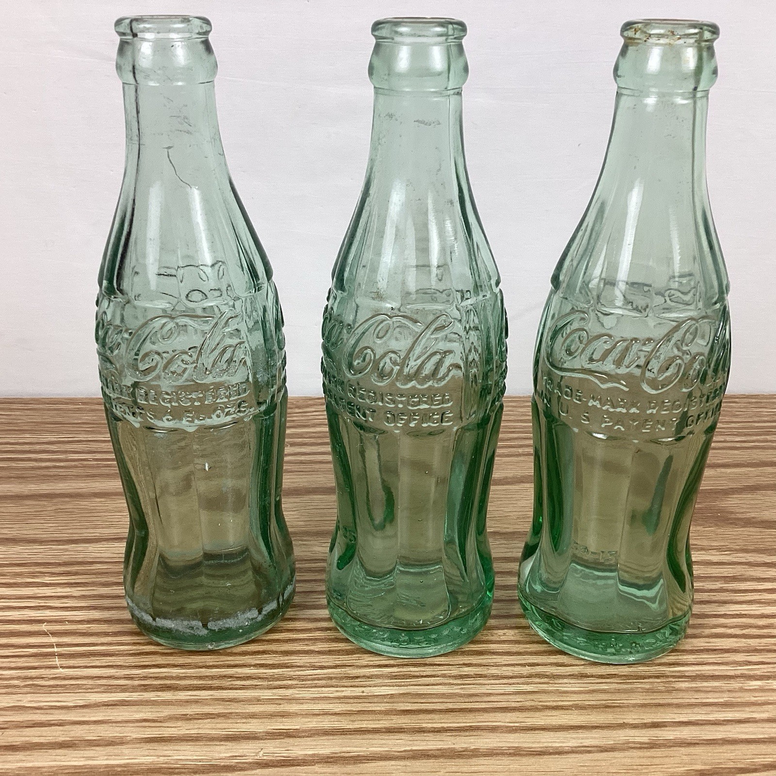 3 VTG Coca Cola 6 oz Bottles Hobbleskirt 1950’s Oshkosh WIS Wisconsin Dells