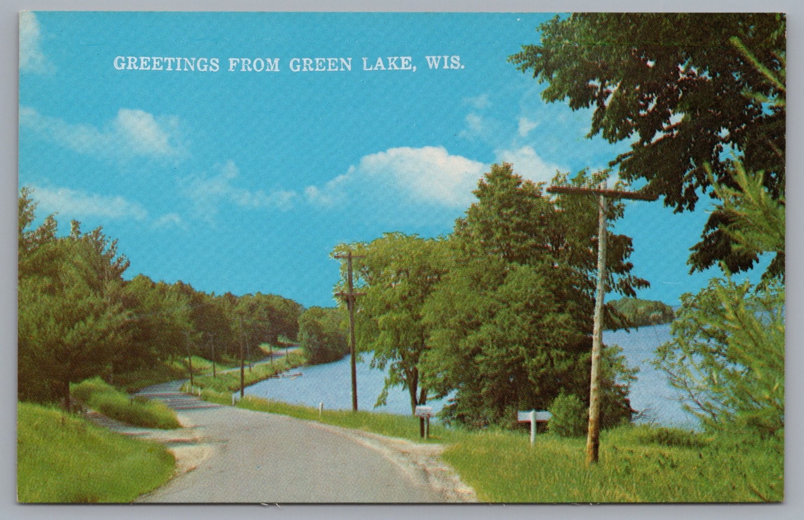 Greetings from Green Lake Wisconsin Road Lake Trees Postcard Greetings from Green Lake Wisconsin Road Lake Trees Postcard