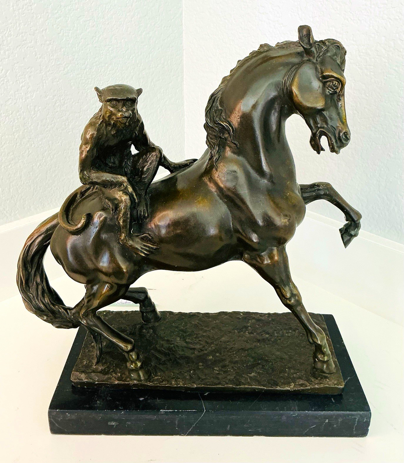 Bronze Tone Patina Monkey Riding Horse Figurine on Black Marble Base Bronze Tone Patina Monkey Riding Horse Figurine on Black Marble Base