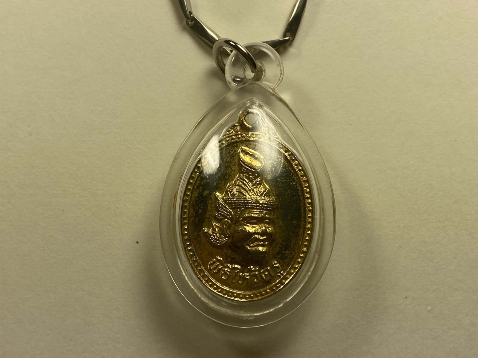 Vintage Golden Thai Buddha Amulet with a New 24