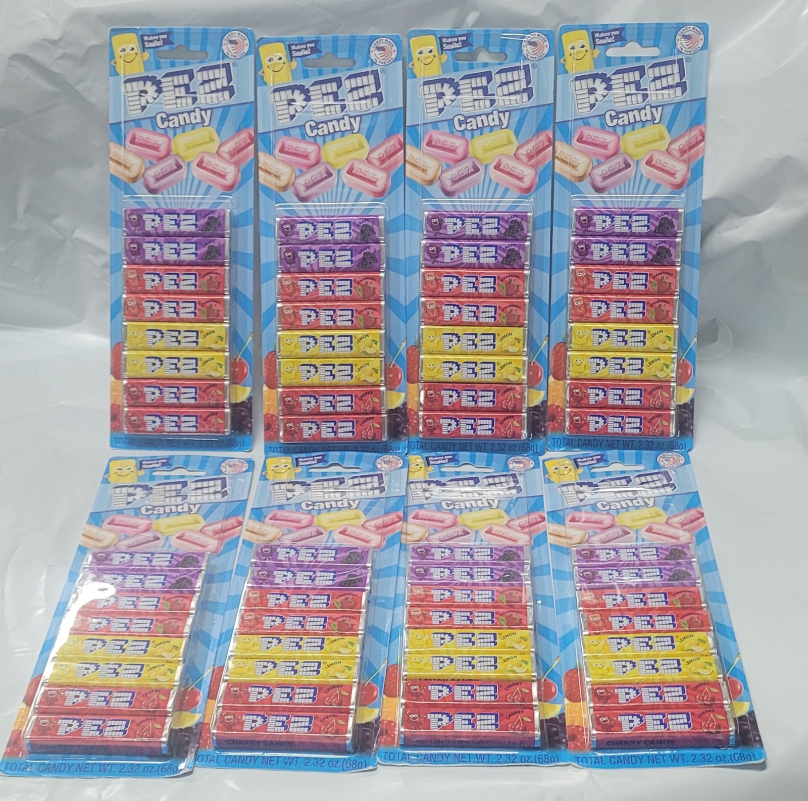 PEZ CANDY REFILLS- 8 PACKS- GRAPE, STRAWBERRY, LEMON & CHERRY FLAVOR-EXP 10/2030