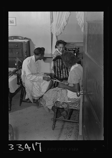 Photo:1930s 1940s African American Women Sewing in Bedroom Interior