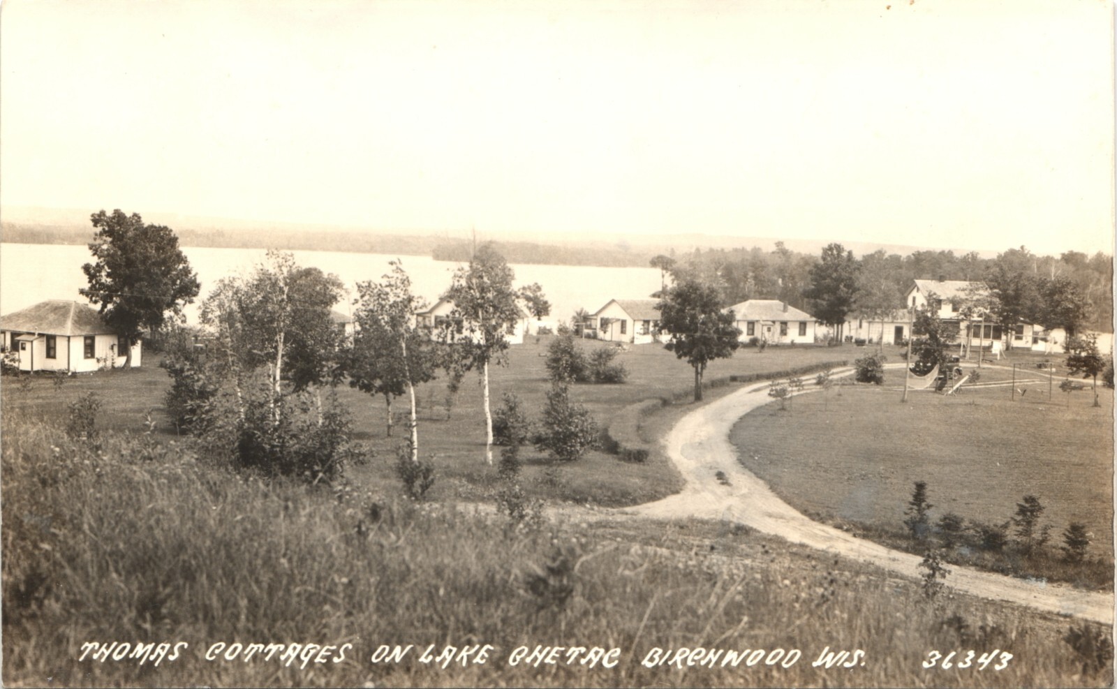 BIRCHWOOD WISCONSIN LAKE CHETAC COTTAGES real photo postcard rppc thomas wi