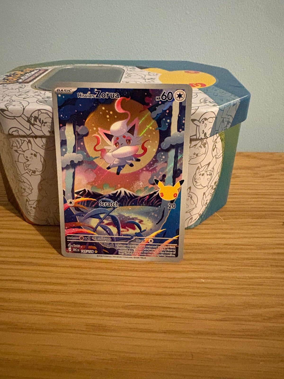 Hisuian Zorua 145/128 Me: 30th Celebration Holo