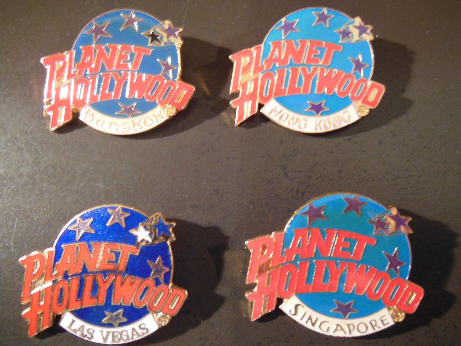 Four (4) Planet Hollywood Logo Pins SINGAPORE, HONG KONG, BANGKOK, LAS VEGAS Four (4) Planet Hollywood Logo Pins SINGAPORE, HONG KONG, BANGKOK, LAS VEGAS