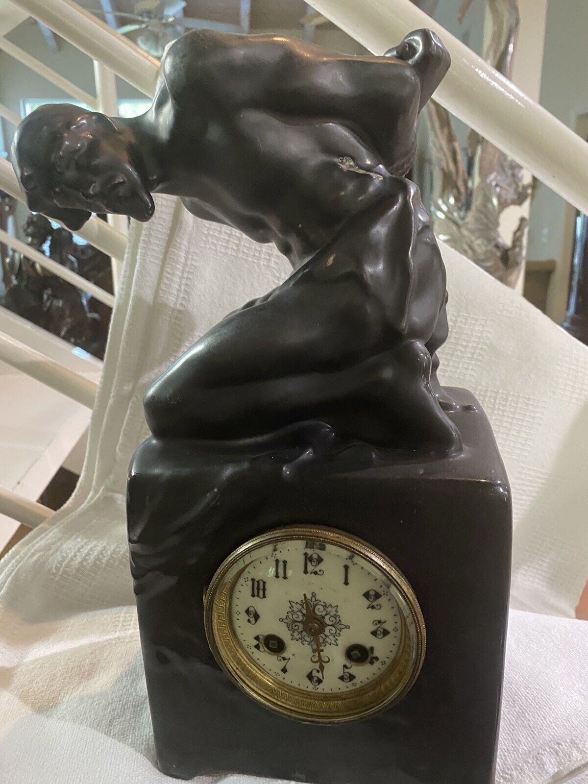 French Figurative porcelain clock “BONDAGE FIGURE”
