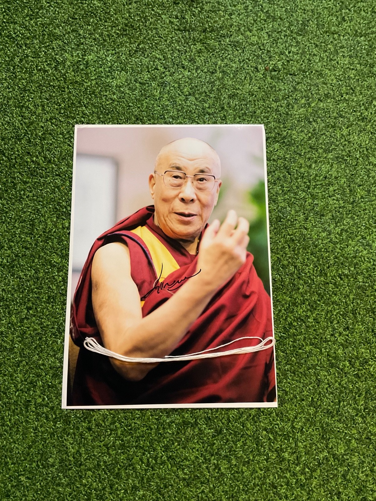 Rare hand-signed dalai Lama photo and his personal cord Rare hand-signed dalai Lama photo and his personal cord