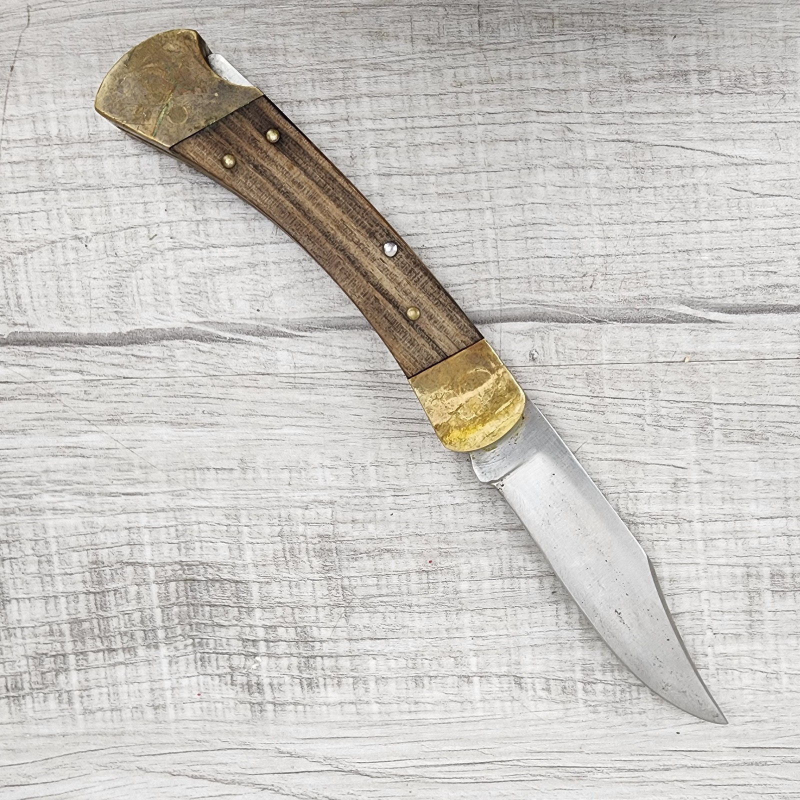 Vintage Buck 110 Folding Hunter Lockback Pocket Knife USA Dymondwood Brass