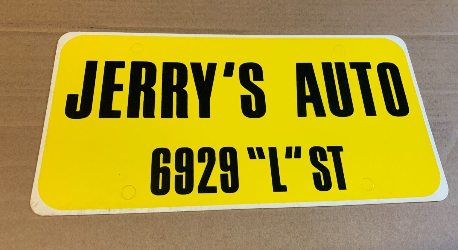 Jerry's Auto Omaha Nebraska Car Dealership Booster License Plate Advertising