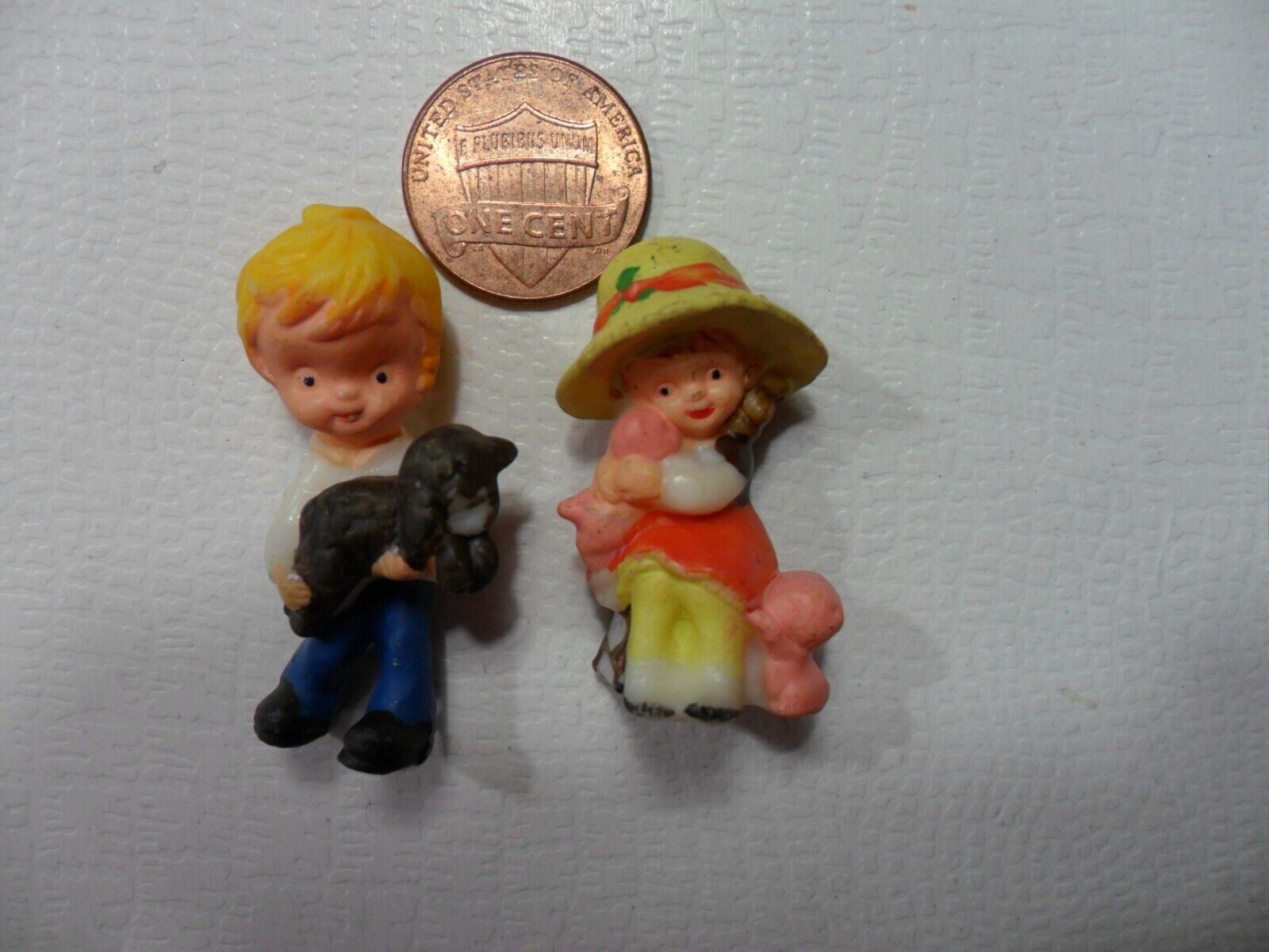 Plastic Miniature Boy and Girl Holding Puppies - Vintage - Made in Hong Kong