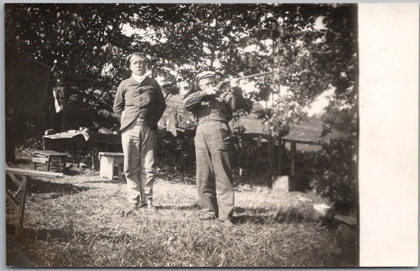 Vintage 1910s HUNTING Photo RPPC Postcard / 2 Older Hunters Playing with Rifle