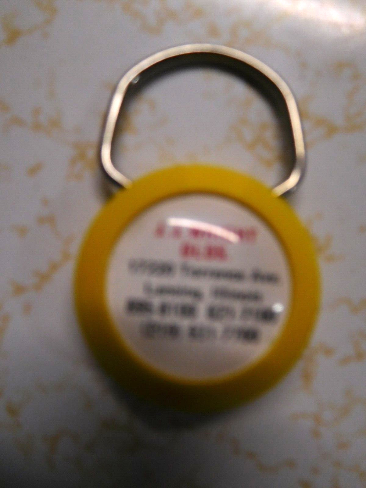 Vintage J.J. Wright Olds Auro Dealership Lansing, ILL Round Yellow KeyChain