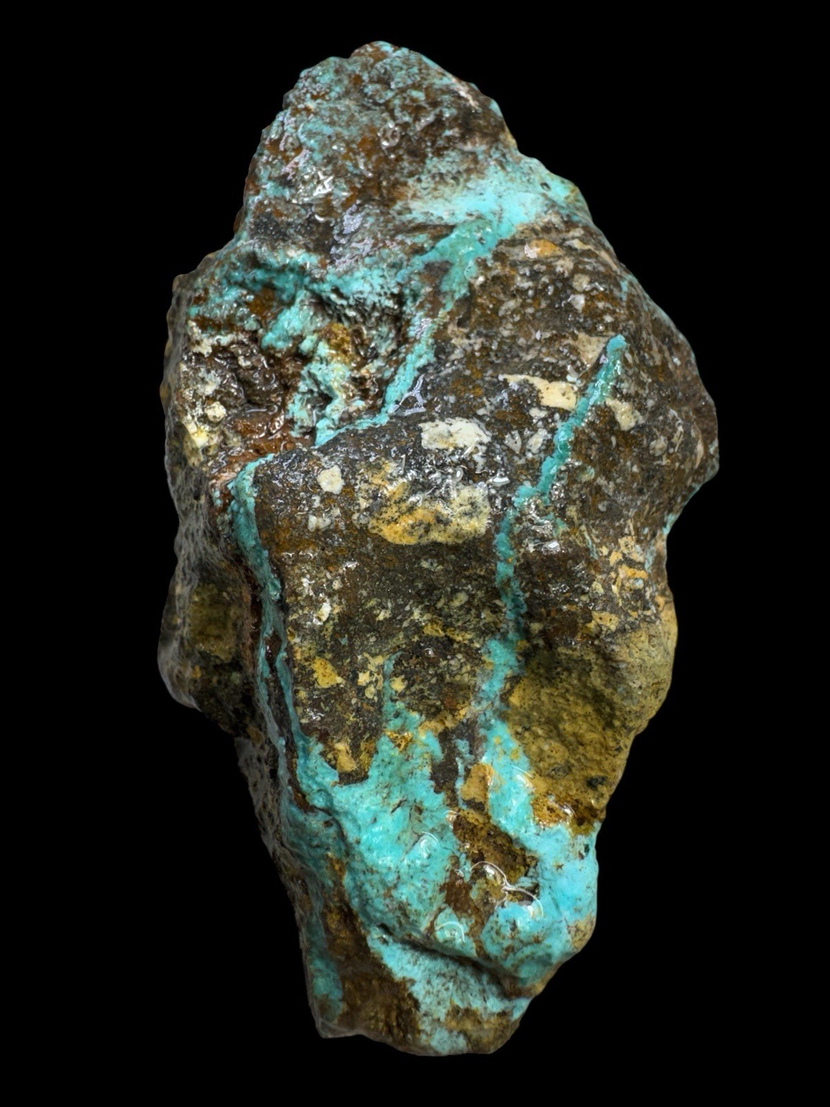 Hubei turquoise stabilized , brown and yellow host rock very nice blue ban