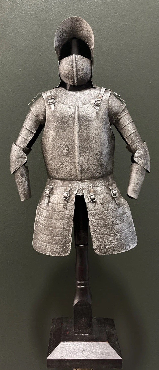 Vintage Metal Knight with Armor on Stand.