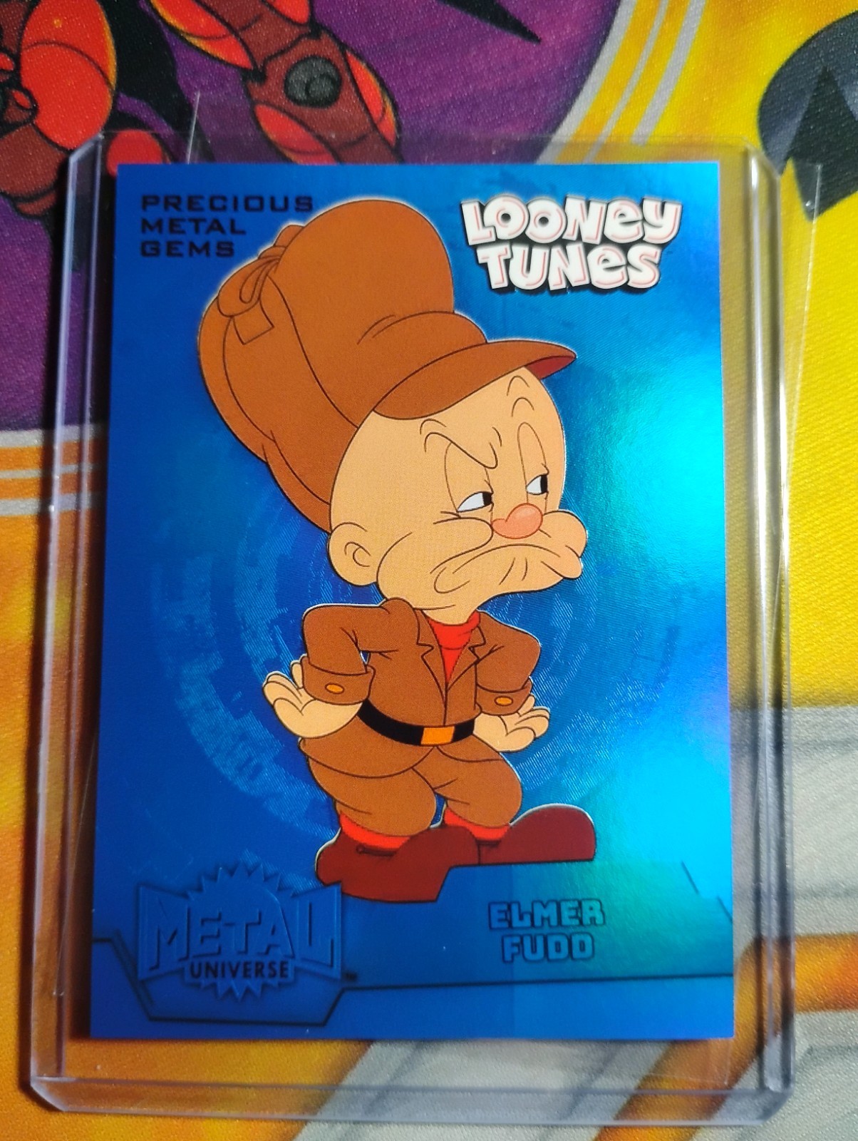 2024 Fleer Retro Looney Tunes Metal Universe PMG Blue 7/50 Elmer Fudd #MU-34 c6x