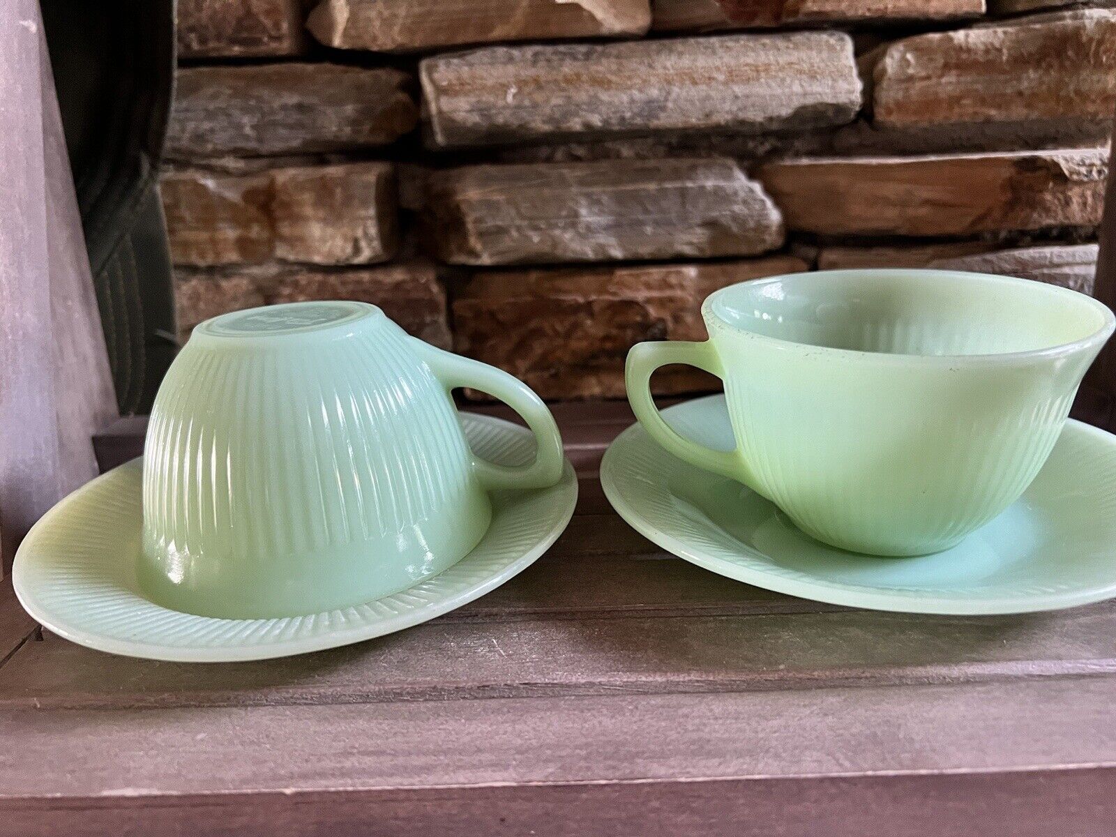 Pair Fire King Jane Ray Tea Cup and Saucer Jadeite Green Glass ornate bottom