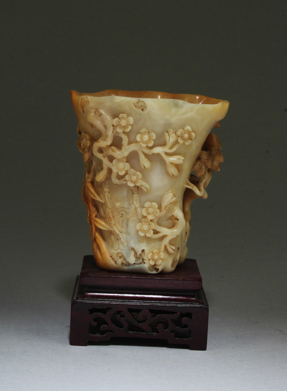 Chinese Carved Shoushan Cup. Comes fitted with a wooden stand